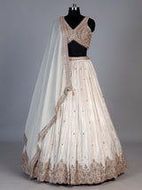 Cream silk embellished lehenga choli with elegant dupatta