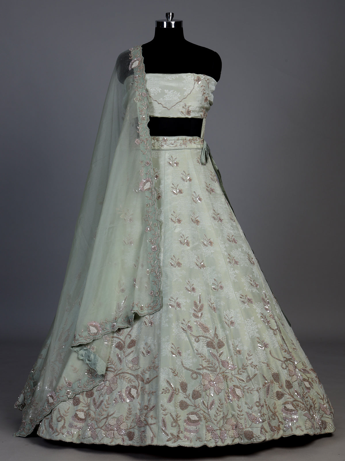 Mint green silk unstitched lehenga choli with dupatta