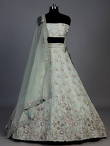 Mint green silk unstitched lehenga choli with dupatta