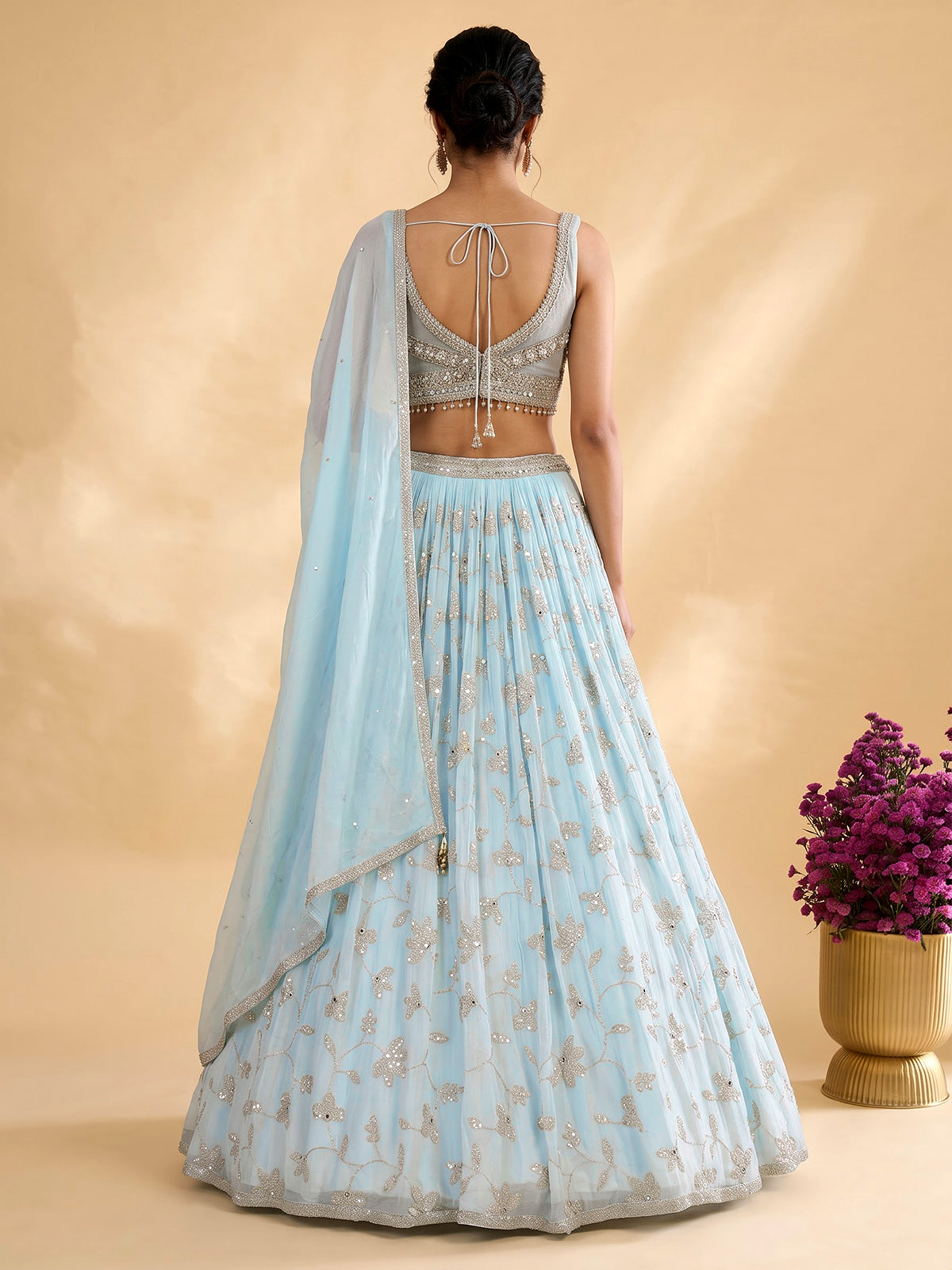 Mint blue georgette lehenga with floral embellished elegance