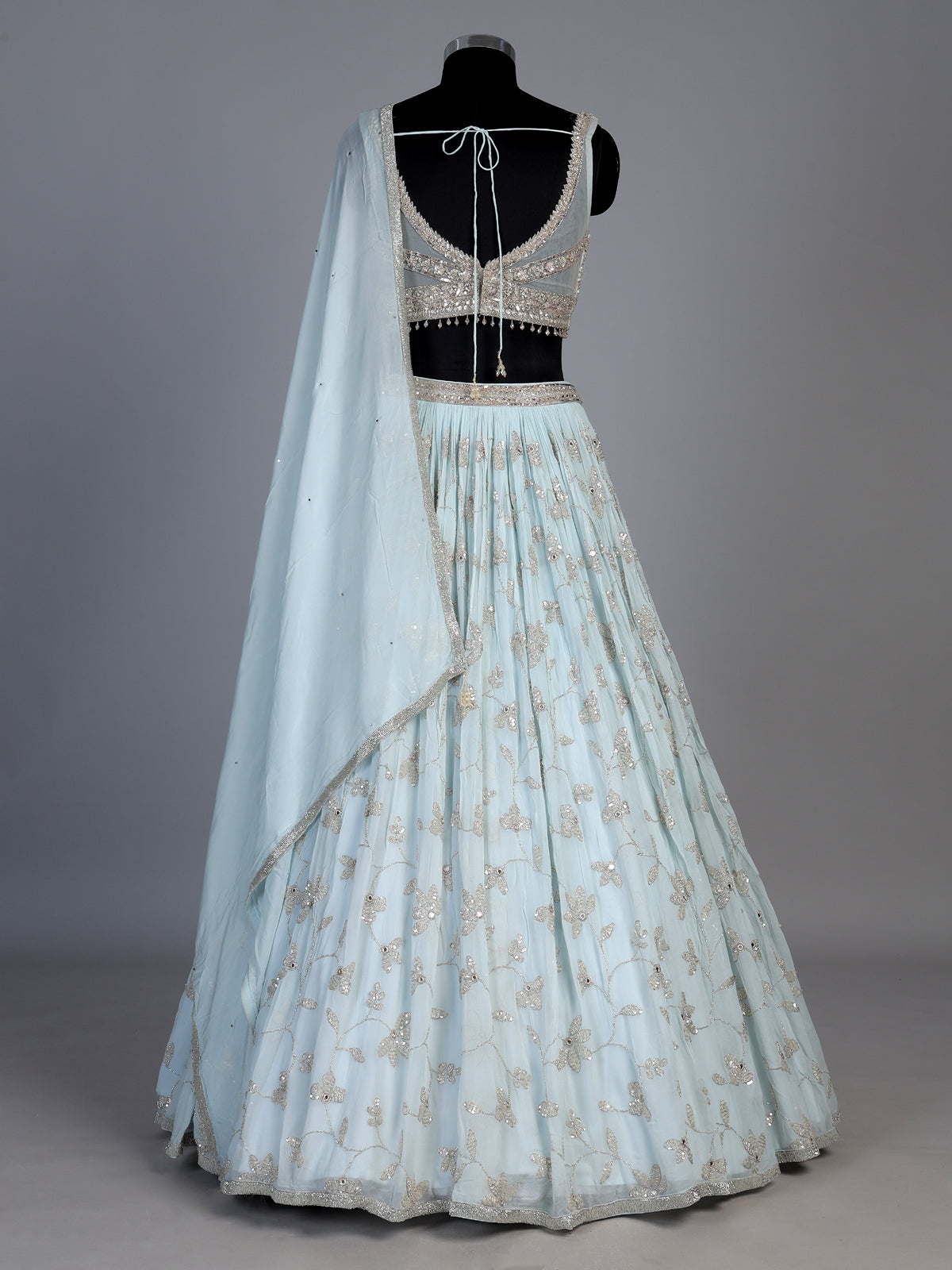 Mint blue georgette lehenga with floral embellished elegance