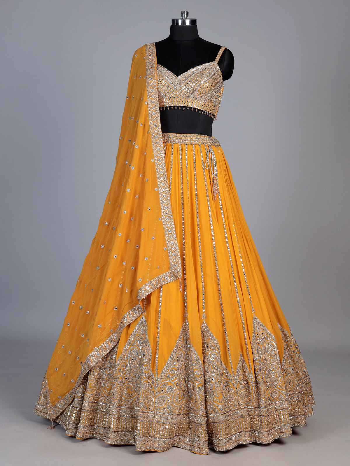 Mustard yellow georgette embellished lehenga choli with dupatta