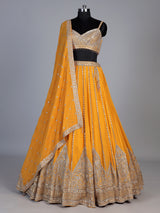 Mustard yellow georgette embellished lehenga choli with dupatta