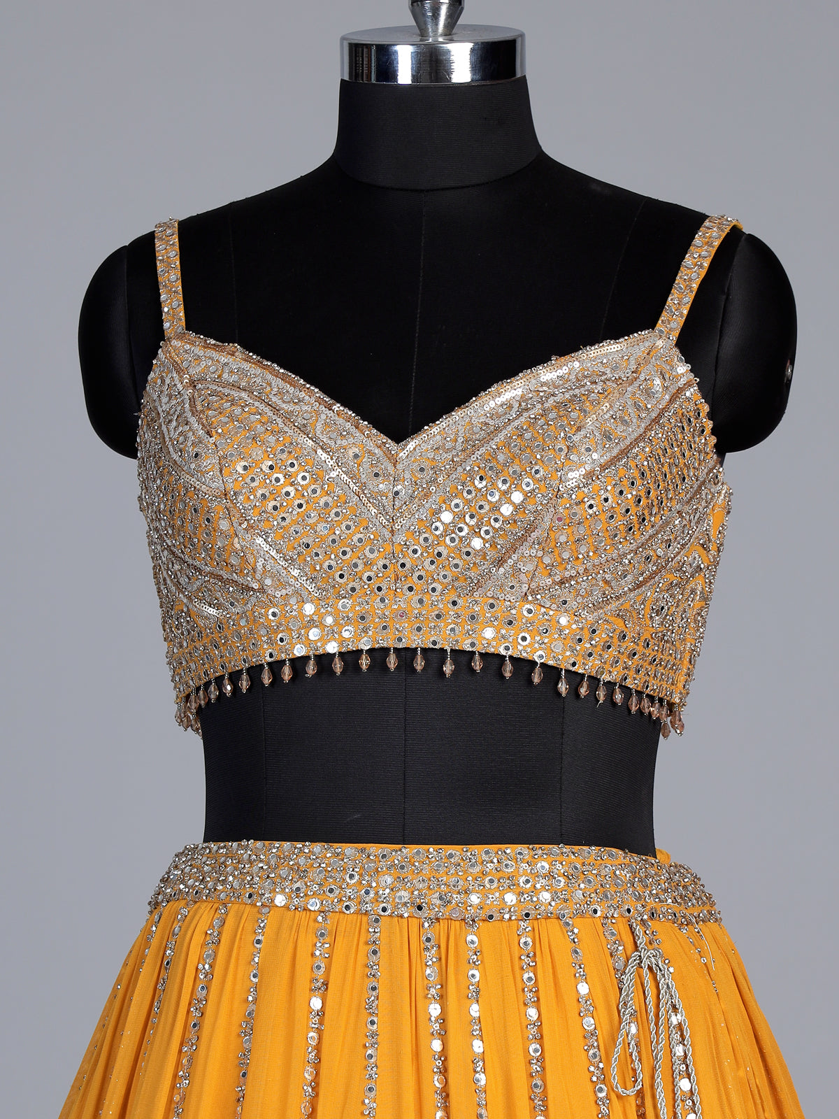 Mustard yellow georgette embellished lehenga choli with dupatta