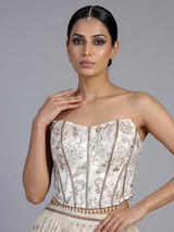 Beige chiffon silk lehenga choli with refined resham embellishments