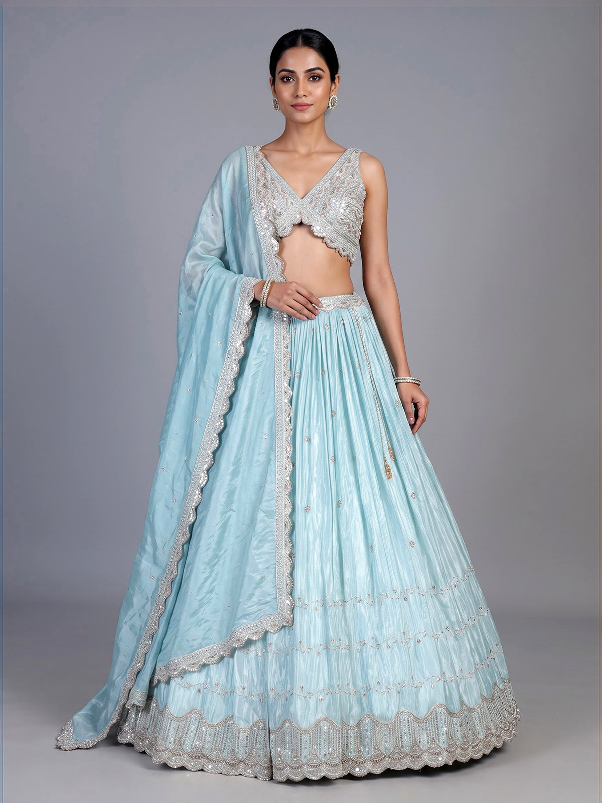 Sky blue tissue silk lehenga choli with exquisite embellished detailing