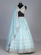 Sky blue tissue silk lehenga choli with exquisite embellished detailing