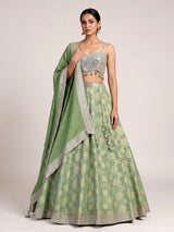 Pista green brocade silk lehenga choli with bandhani designer charm