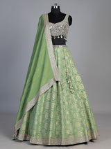 Pista green brocade silk lehenga choli with bandhani designer charm