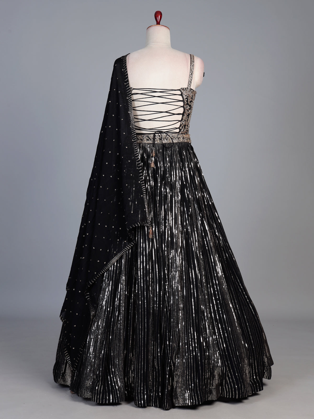 Black georgette designer lehenga with mirror and stone work