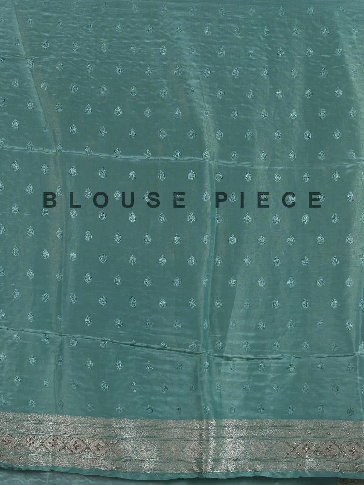 Mint blue silk saree with elegant peacock motif work