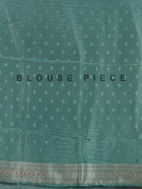 Mint blue silk saree with elegant peacock motif work