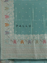 Mint blue silk saree with elegant peacock motif work