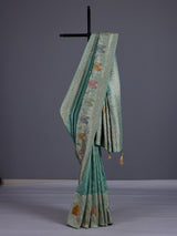 Mint blue silk saree with elegant peacock motif work