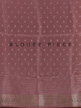 Pink silk saree with graceful peacock motif embellishments