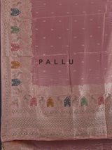 Pink silk saree with graceful peacock motif embellishments