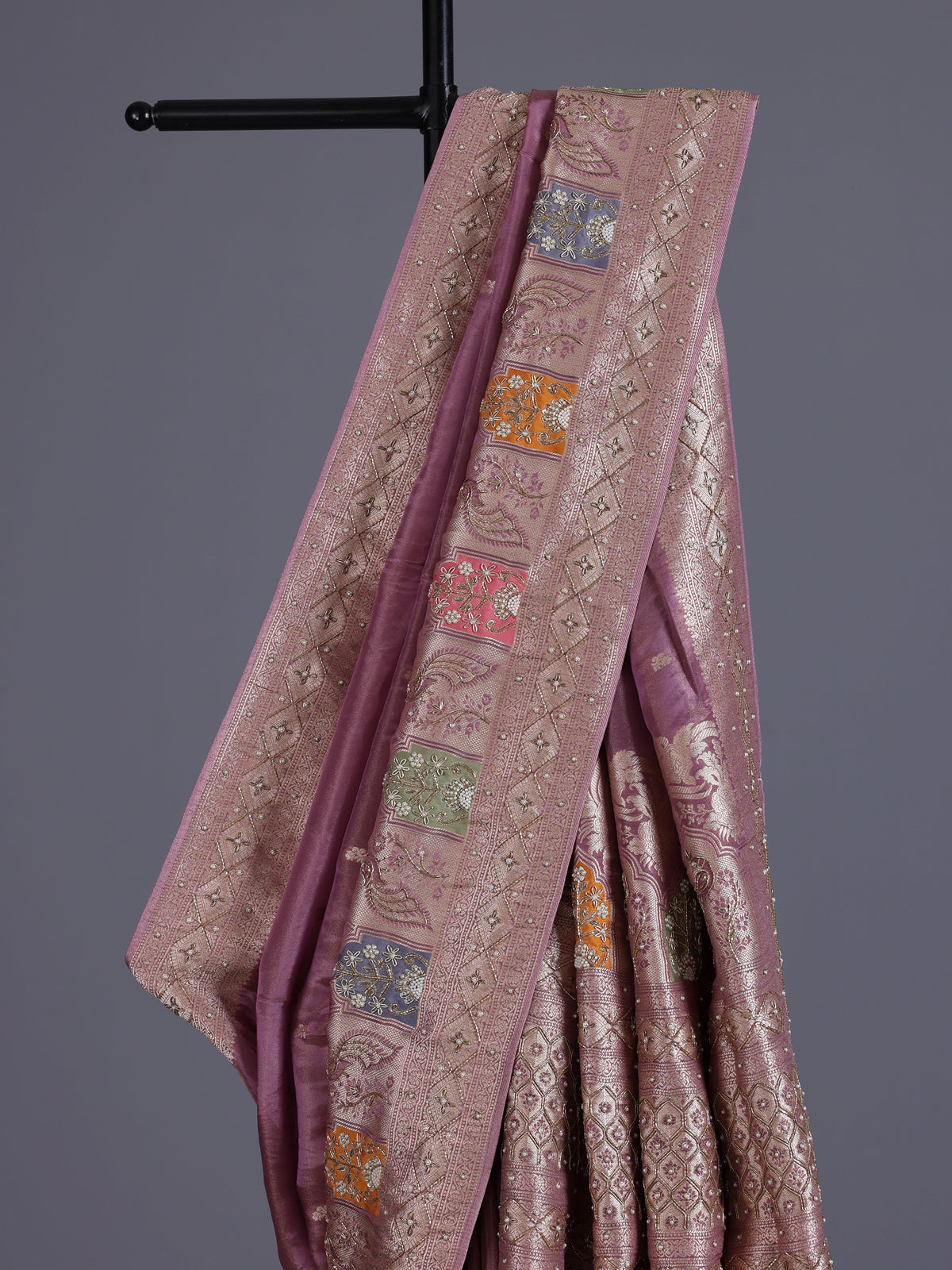 Mauve purple silk saree with rich peacock motif detailing