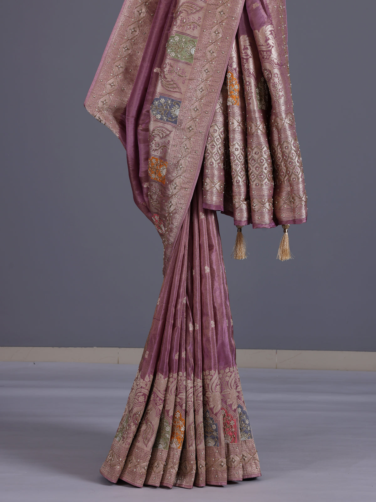 Mauve purple silk saree with rich peacock motif detailing