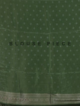 Pista green silk saree with elegant peacock motif embellishments