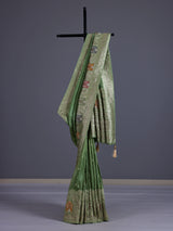 Pista green silk saree with elegant peacock motif embellishments