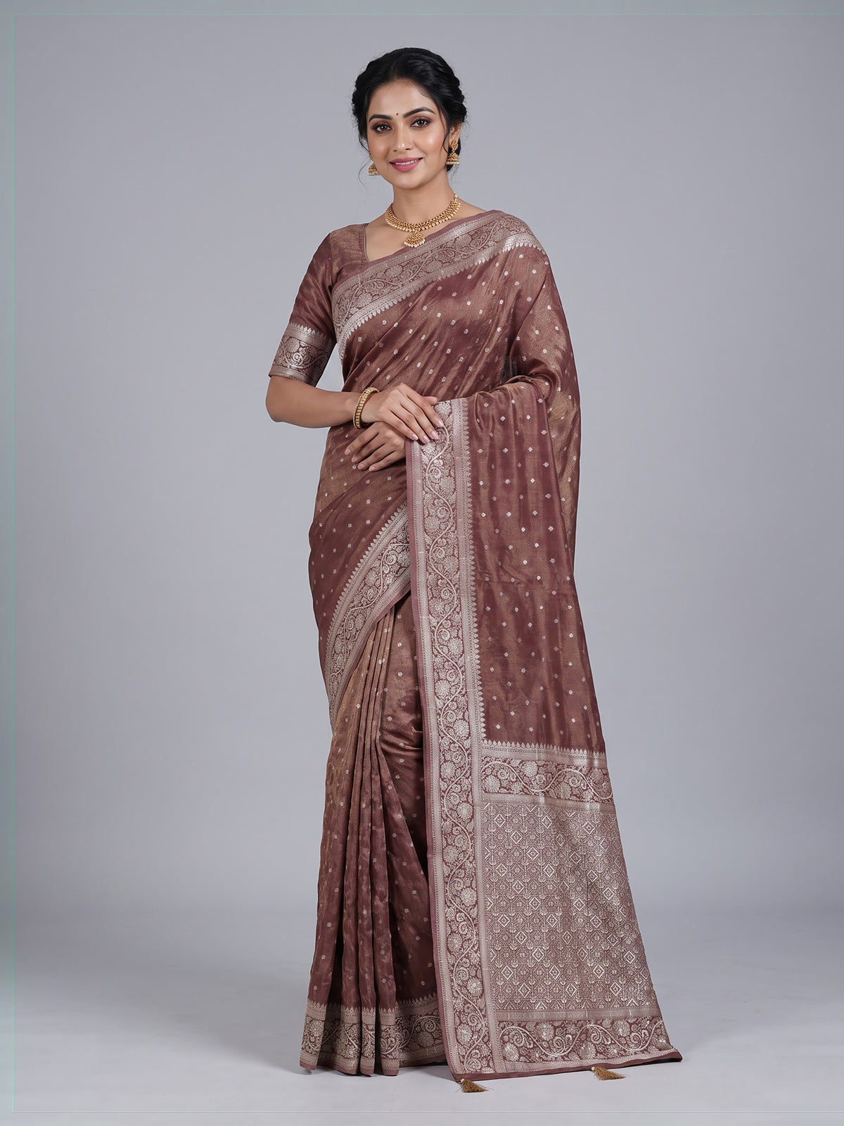 Chocolate brown silk saree with luxurious butti and tassels