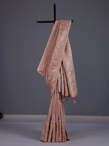 Onion pink silk saree with graceful traditional pallu tassels
