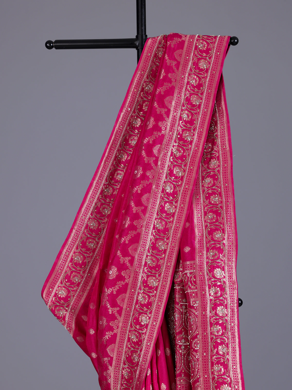 Rani pink silk saree with elegant butti work