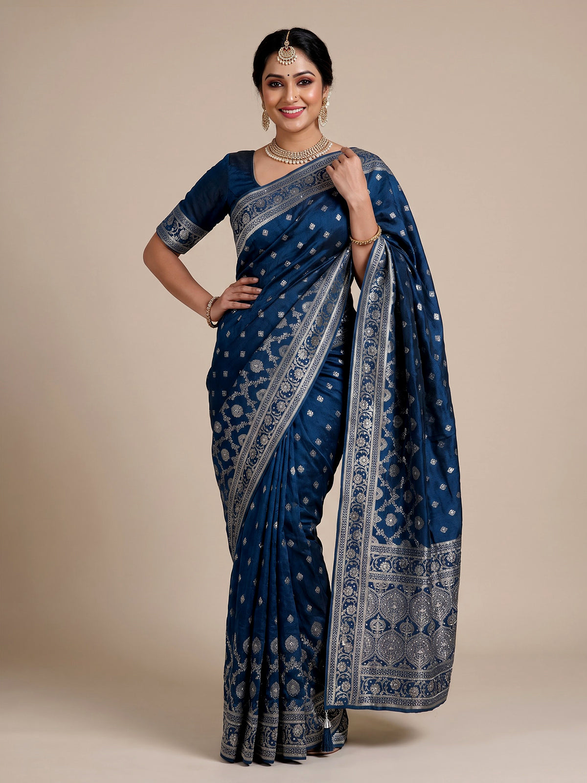 Peacock blue silk saree with exquisite traditional embellished detailing