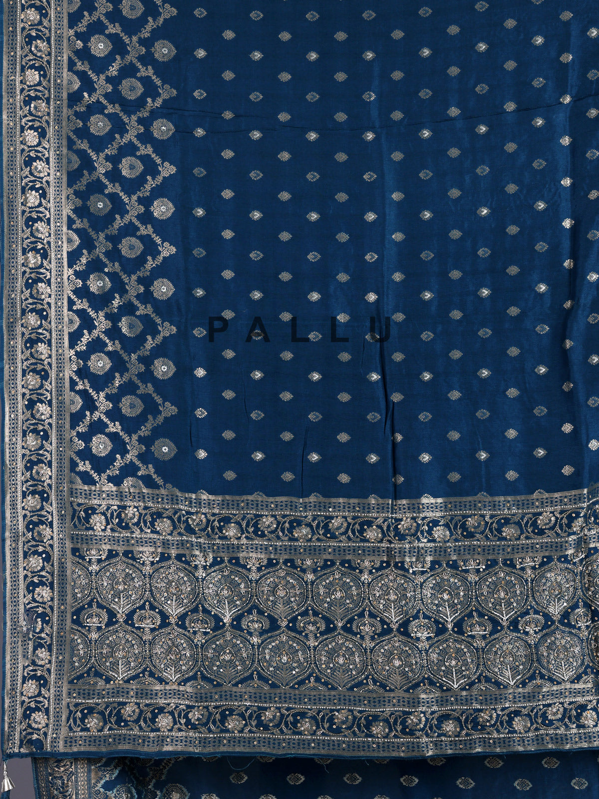 Peacock blue silk saree with exquisite traditional embellished detailing