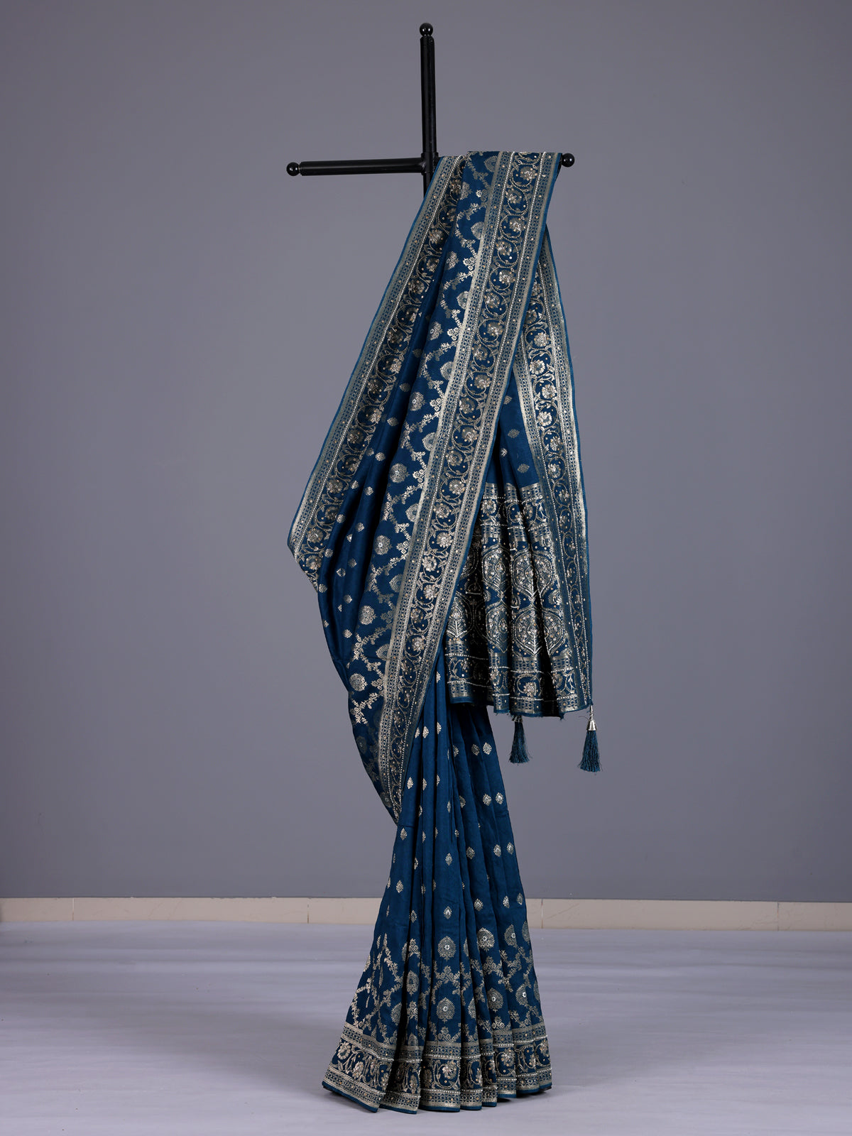 Peacock blue silk saree with exquisite traditional embellished detailing