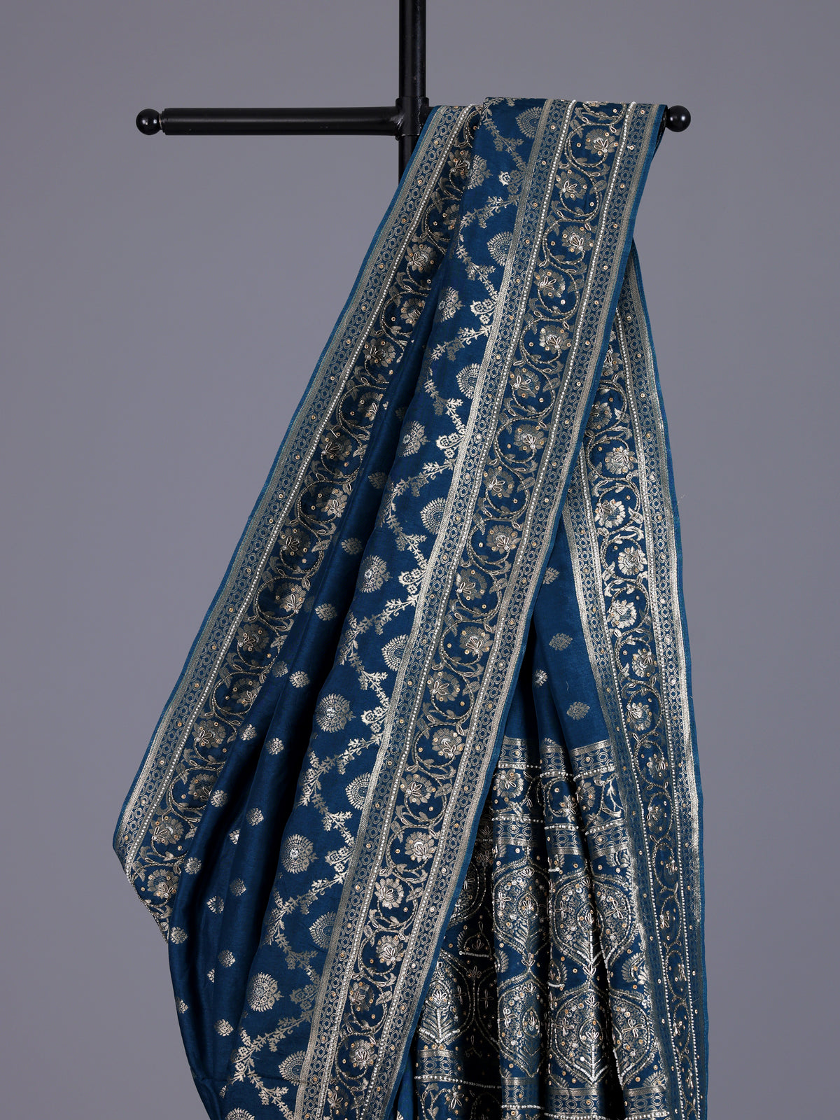 Peacock blue silk saree with exquisite traditional embellished detailing