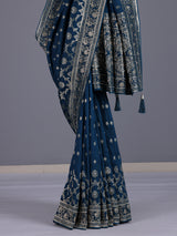 Peacock blue silk saree with exquisite traditional embellished detailing