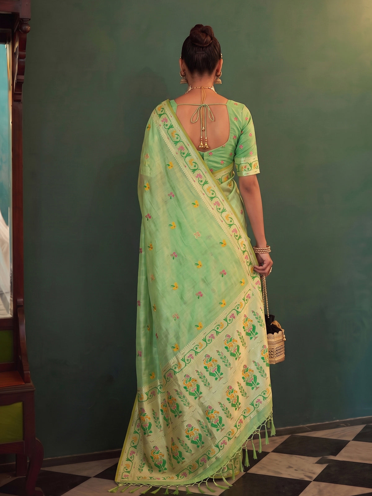 Green royal floral tissue silk saree