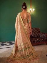 Pastel peach festive tissue silk saree