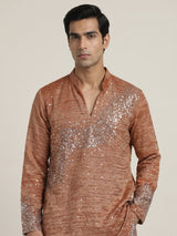 Pastel orange metallic silk tissue kurta suit with embellishments for men