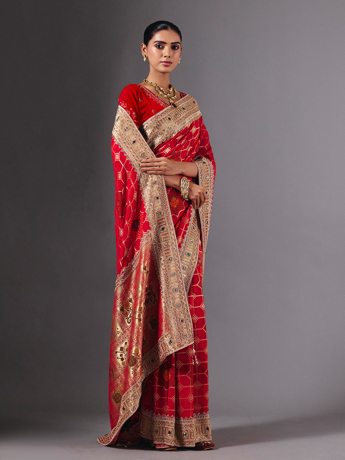 Radiant red georgette saree with zari animal motif embellishments
