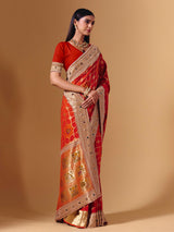 Orange georgette saree with sparkling animal motif detailing