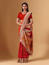 Orange georgette saree with sparkling animal motif detailing