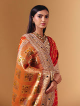 Orange georgette saree with sparkling animal motif detailing