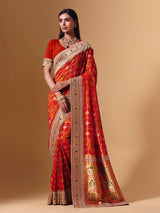 Orange georgette saree with sparkling animal motif detailing