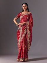 Maroon gharchola silk saree with peacock motif embellishments