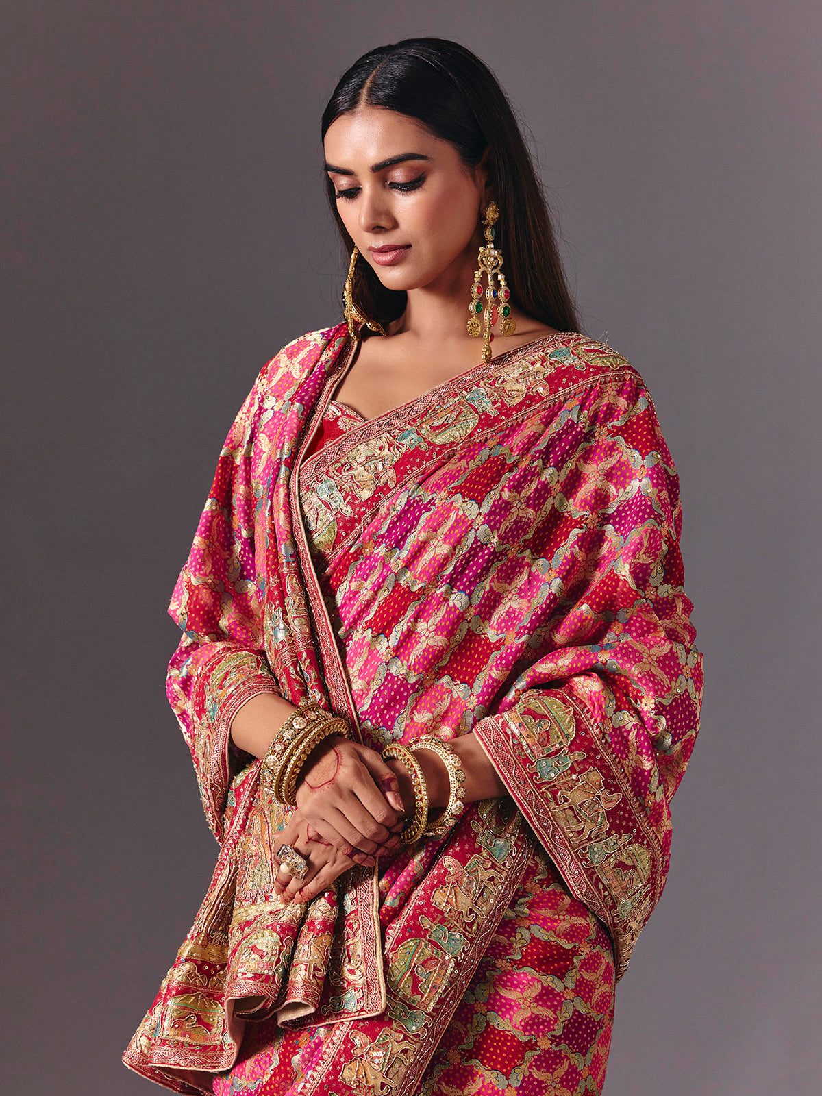 Pink dola silk saree with doli barat bandhani detailing