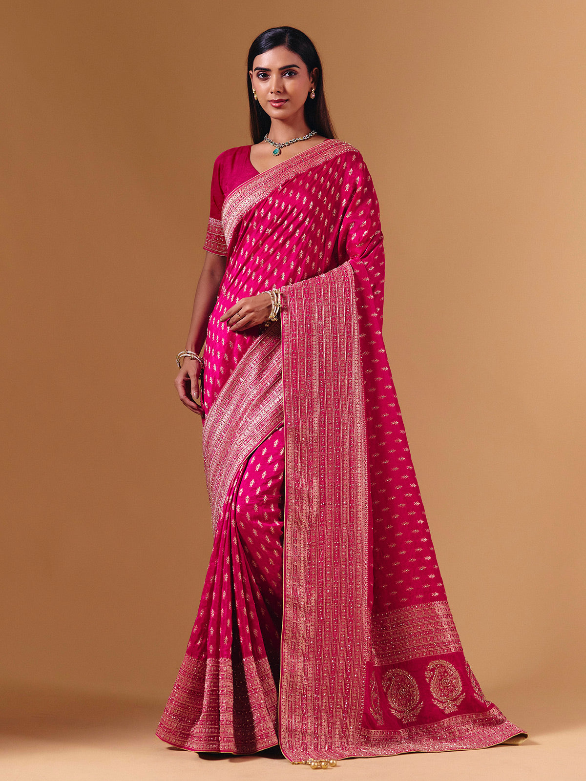 Rani pink dola silk saree with elegant zari butti work