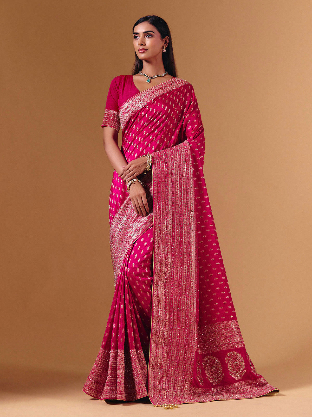 Rani pink dola silk saree with elegant zari butti work