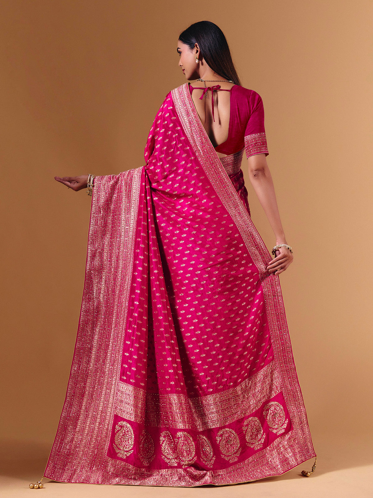 Rani pink dola silk saree with elegant zari butti work