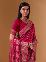 Rani pink dola silk saree with elegant zari butti work