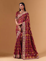 Maroon gharchola silk saree with elephant motif artistry