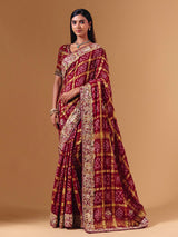 Maroon gharchola silk saree with elephant motif artistry