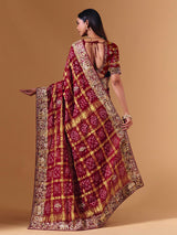 Maroon gharchola silk saree with elephant motif artistry