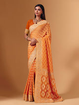 Orange georgette saree with bandhani print and zardosi embellishments